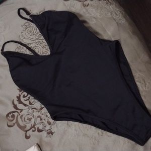 One piece bathing suit, high cut sides